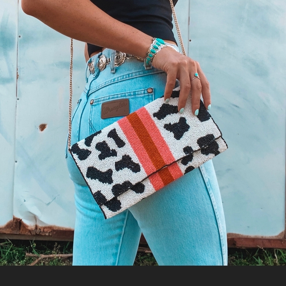 Pink and Black Clutch with Unique Design and Bold Color Accents